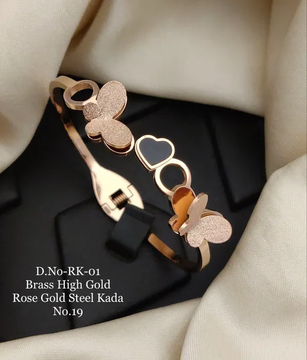 https://d1311wbk6unapo.cloudfront.net/NushopCatalogue/tr:f-webp,w-600,fo-auto/D.NO-RK-01 Brass High Rose Gold Steel Kada_1685186189339_euvos12ntgnii16.jpg__Ketmera